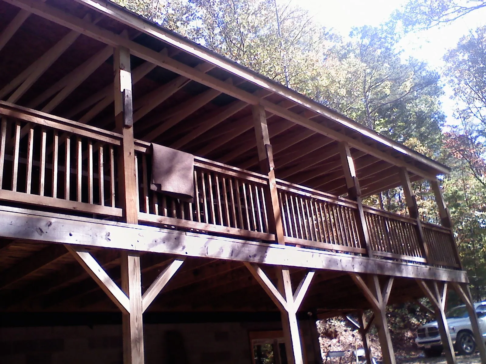 Timber framing under a new elevated porch and deck — Roof Leak Repair in Henniker by Roofing Brothers